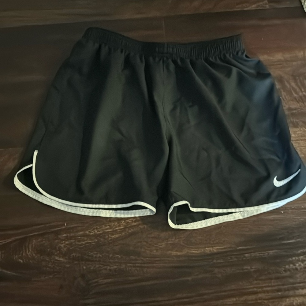 NIKE woman’s shorts size small black NEVER USED